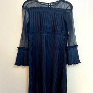 Navy pleated knee length dress with mesh